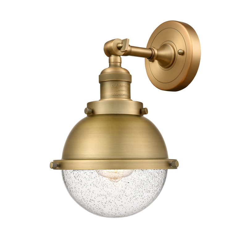 Hampden Sconce shown in the Brushed Brass finish with a Seedy shade