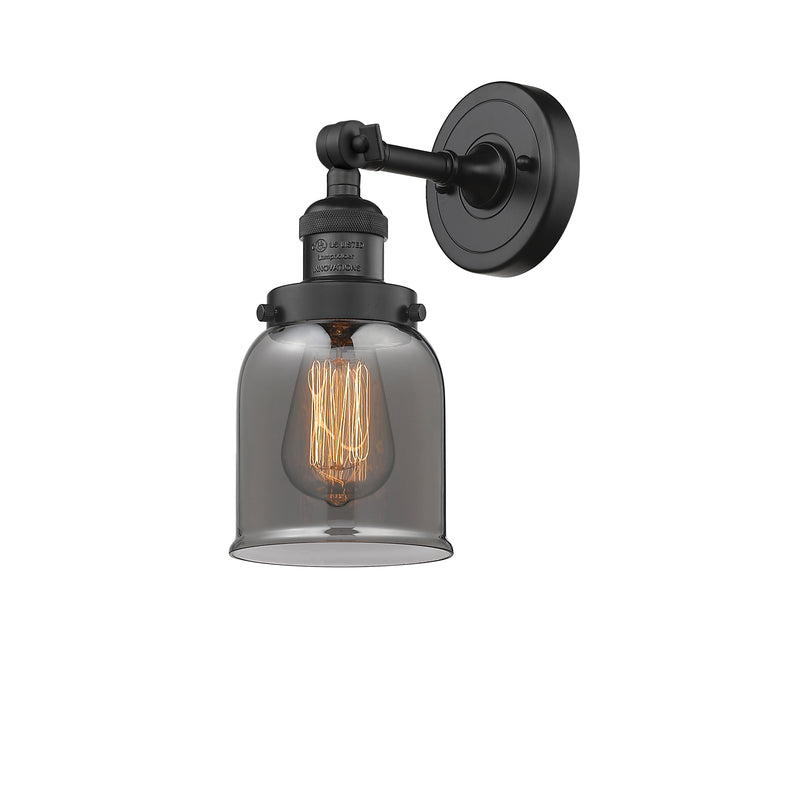 Bell Sconce shown in the Matte Black finish with a Plated Smoke shade