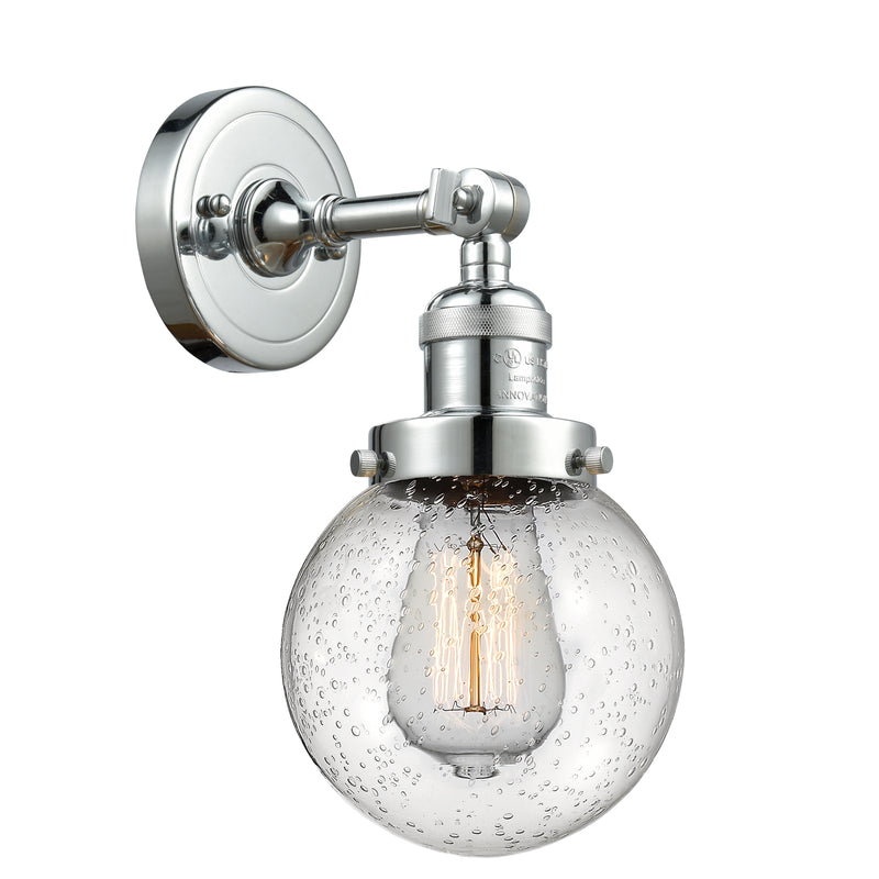 Beacon Sconce shown in the Polished Chrome finish with a Seedy shade