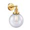 Beacon Sconce shown in the Satin Gold finish with a Seedy shade