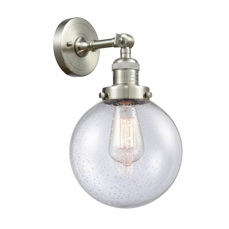 Beacon Sconce shown in the Brushed Satin Nickel finish with a Seedy shade