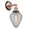 Geneseo Sconce shown in the Antique Copper finish with a Clear Crackled shade