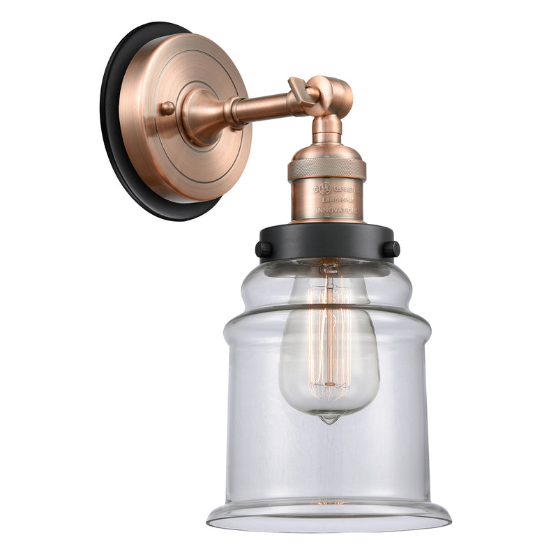 Canton Sconce shown in the Antique Copper finish with a Clear shade