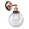 Beacon Sconce shown in the Antique Copper finish with a Seedy shade