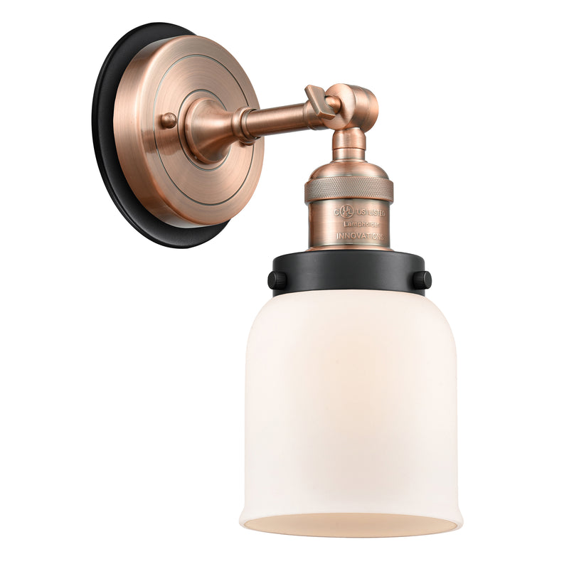 Bell Sconce shown in the Antique Copper finish with a Matte White shade