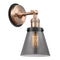 Cone Sconce shown in the Antique Copper finish with a Plated Smoke shade