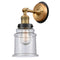 Canton Sconce shown in the Brushed Brass finish with a Seedy shade