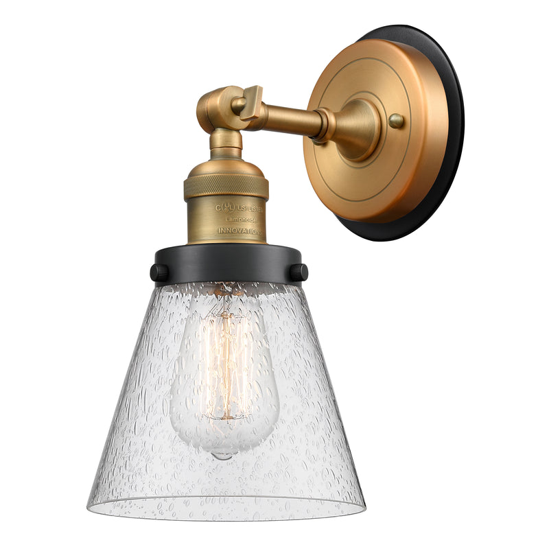 Cone Sconce shown in the Brushed Brass finish with a Seedy shade