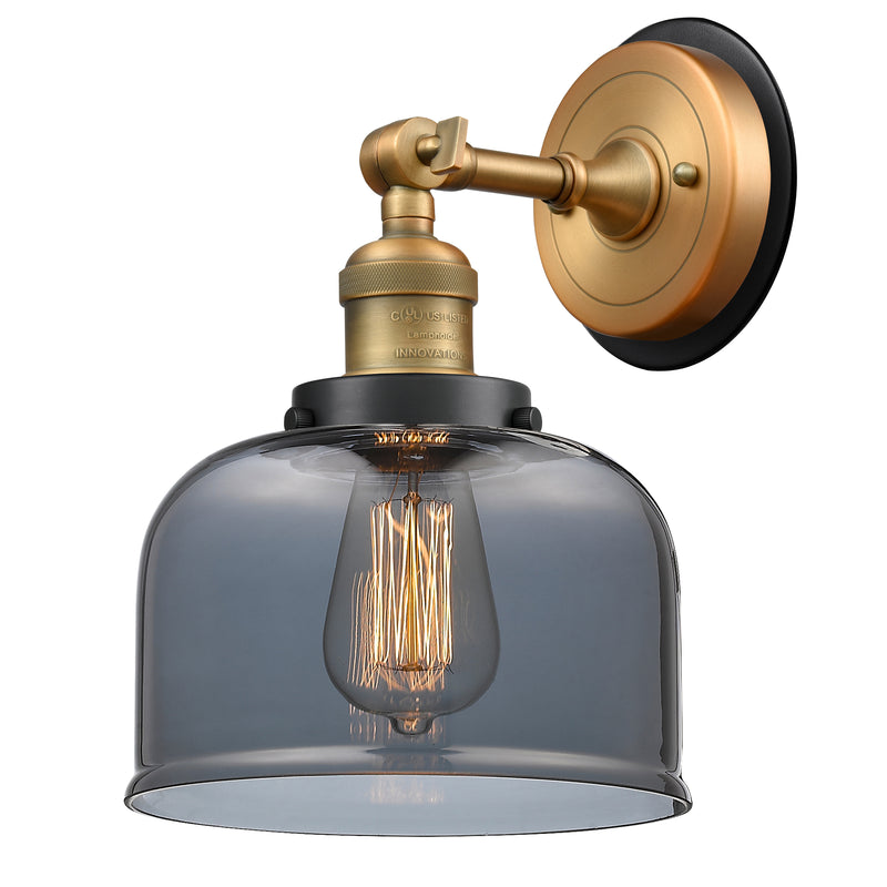 Bell Sconce shown in the Brushed Brass finish with a Plated Smoke shade