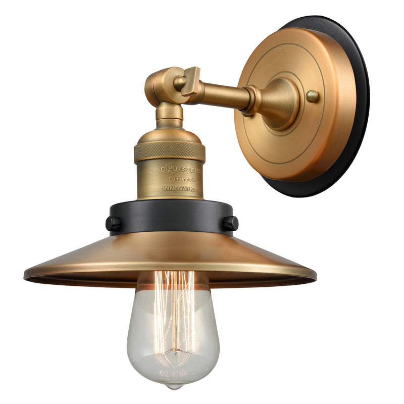 Railroad Sconce shown in the Brushed Brass finish with a Antique Copper shade