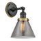 Cone Sconce shown in the Matte Black finish with a Plated Smoke shade