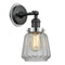 Chatham Sconce shown in the Matte Black finish with a Clear shade