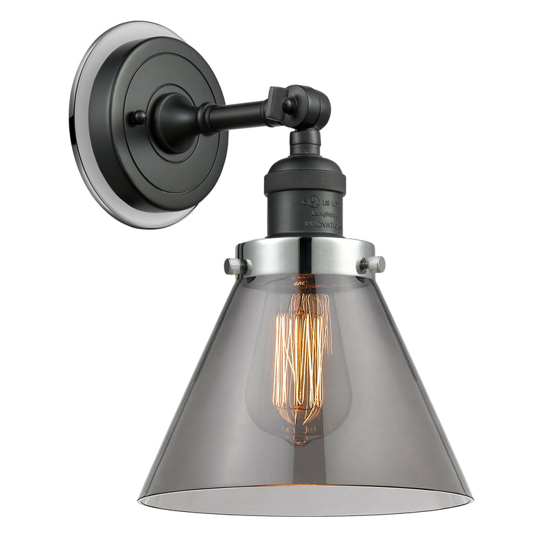 Cone Sconce shown in the Matte Black finish with a Plated Smoke shade