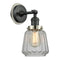 Chatham Sconce shown in the Matte Black finish with a Clear shade