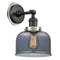 Bell Sconce shown in the Matte Black finish with a Plated Smoke shade