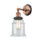 Canton Sconce shown in the Antique Copper finish with a Clear shade