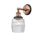 Colton Sconce shown in the Antique Copper finish with a Clear Halophane shade