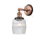 Colton Sconce shown in the Antique Copper finish with a Clear Halophane shade