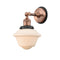 Oxford Sconce shown in the Antique Copper finish with a Matte White shade