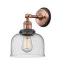 Bell Sconce shown in the Antique Copper finish with a Seedy shade