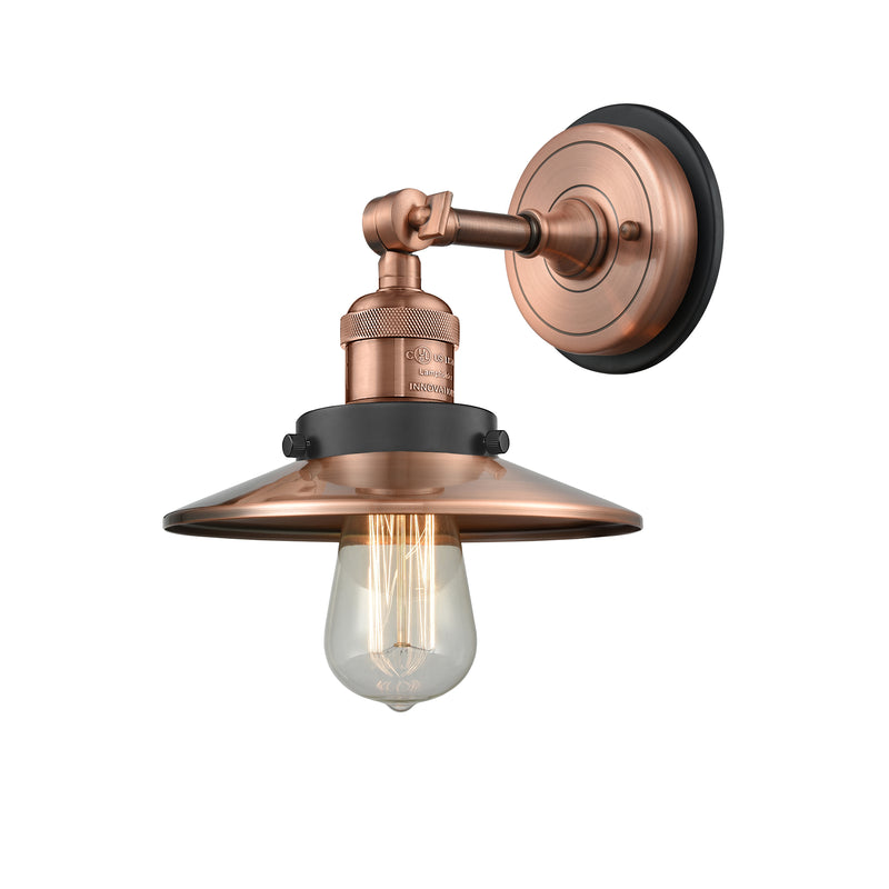 Railroad Sconce shown in the Antique Copper finish with a Antique Copper shade