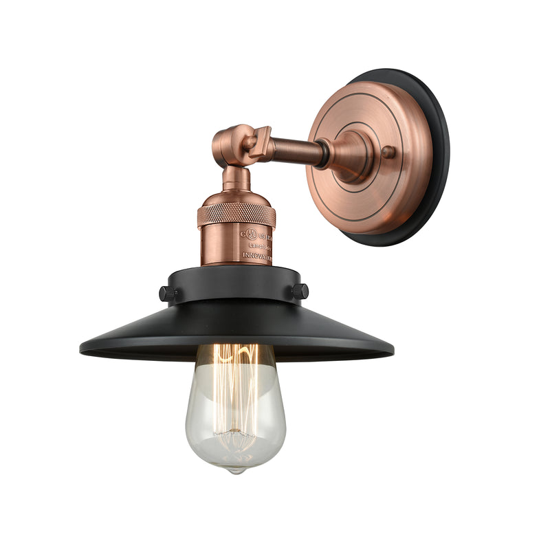 Railroad Sconce shown in the Antique Copper finish with a Antique Copper shade