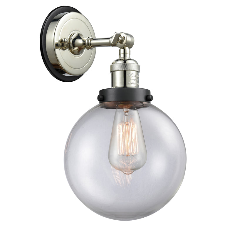 Beacon Sconce shown in the Polished Nickel finish with a Clear shade