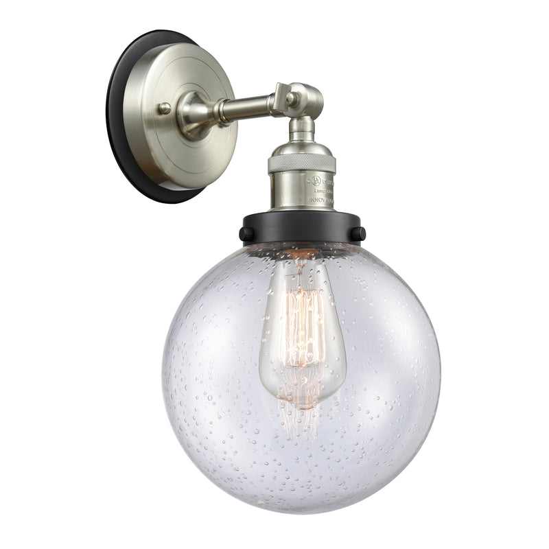 Beacon Sconce shown in the Brushed Satin Nickel finish with a Seedy shade