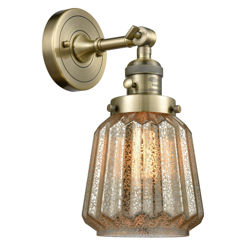 Chatham Sconce shown in the Antique Brass finish with a Mercury shade