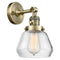 Fulton Sconce shown in the Antique Brass finish with a Clear shade