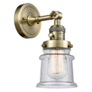 Canton Sconce shown in the Antique Brass finish with a Seedy shade