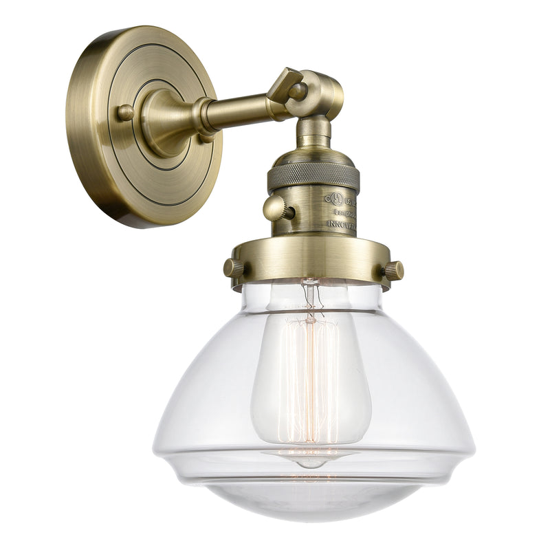 Olean Sconce shown in the Antique Brass finish with a Clear shade