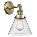 Cone Sconce shown in the Antique Brass finish with a Seedy shade