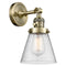 Cone Sconce shown in the Antique Brass finish with a Seedy shade