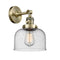 Bell Sconce shown in the Antique Brass finish with a Seedy shade