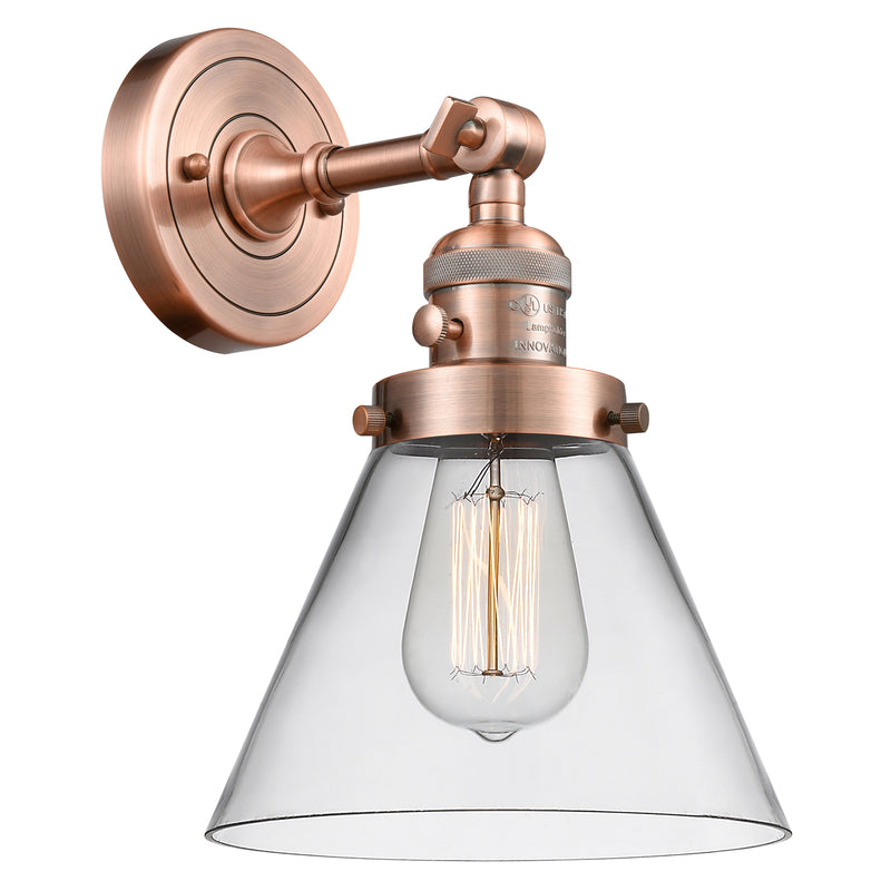 Cone Sconce shown in the Antique Copper finish with a Clear shade