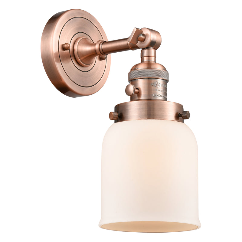 Bell Sconce shown in the Antique Copper finish with a Matte White shade