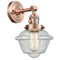 Oxford Sconce shown in the Antique Copper finish with a Seedy shade