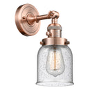 Bell Sconce shown in the Antique Copper finish with a Seedy shade