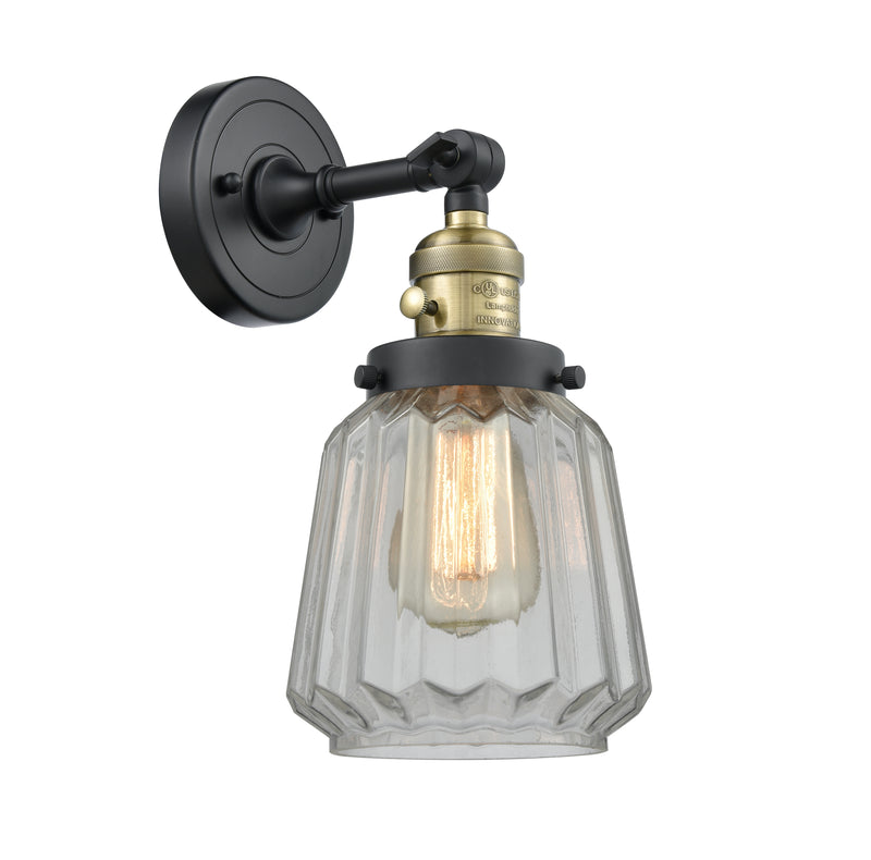 Innovations Lighting Chatham 1-100 watt 6 inch Black Antique Brass Sconce with Clear Fluted glass and Solid Brass 180 Degree Adjustable Swivel With Engraved Cast Cup Includes a "High-Low-Off" Switch. 203SWBABG142