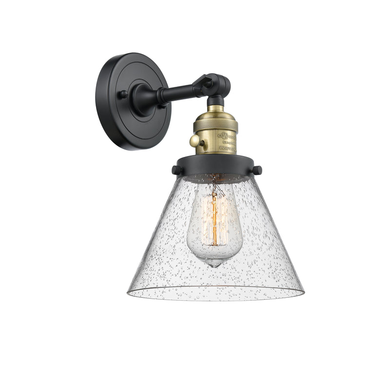 Innovations Lighting Large Cone 1-100 watt 8 inch Black Antique Brass Sconce with Seedy glass and Solid Brass 180 Degree Adjustable Swivel With Engraved Cast Cup Includes a "High-Low-Off" Switch. 203SWBABG44