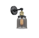 Innovations Lighting Small Bell 1-100 watt 5 inch Black Antique Brass Sconce with Smoked glass and Solid Brass 180 Degree Adjustable Swivel With Engraved Cast Cup Includes a "High-Low-Off" Switch. 203SWBABG53