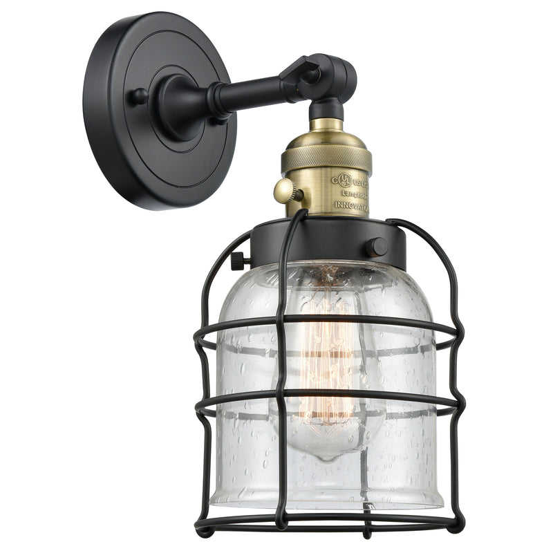 Bell Cage Sconce shown in the Black Antique Brass finish with a Seedy shade