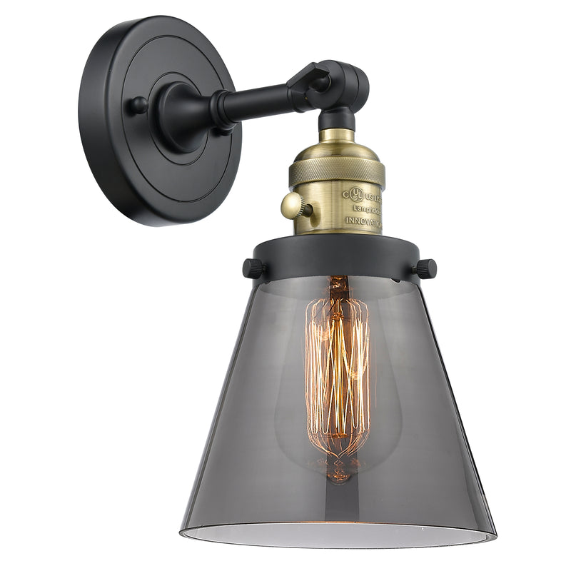 Cone Sconce shown in the Black Antique Brass finish with a Plated Smoke shade