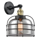 Bell Cage Sconce shown in the Black Antique Brass finish with a Plated Smoke shade