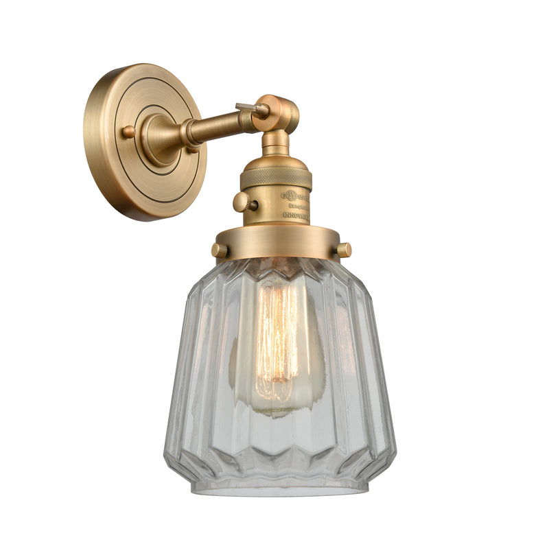 Innovations Lighting Chatham 1-100 watt 6 inch Brushed Brass Sconce with Clear Fluted glass and Solid Brass 180 Degree Adjustable Swivel With Engraved Cast Cup Includes a "High-Low-Off" Switch. 203SWBBG142