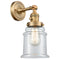 Canton Sconce shown in the Brushed Brass finish with a Clear shade