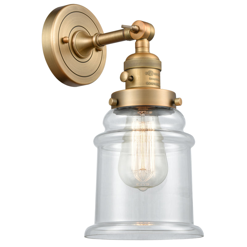 Canton Sconce shown in the Brushed Brass finish with a Clear shade