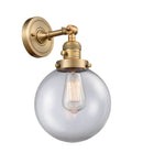 Innovations Lighting Beacon 1-100 watt 8 inch Brushed Brass Sconce with Clear glass and Solid Brass 180 Degree Adjustable Swivel With Engraved Cast Cup Includes a "High-Low-Off" Switch. 203SWBBG2028