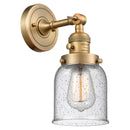 Bell Sconce shown in the Brushed Brass finish with a Seedy shade